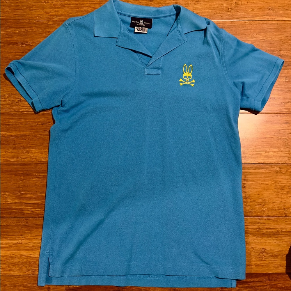 Blue and yellow psycho bunny like new no tags  polo shirt size medium.